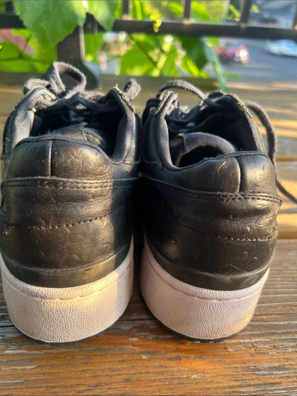 adidas Forum Black Leather Low-Top Sneakers with Gold Accents